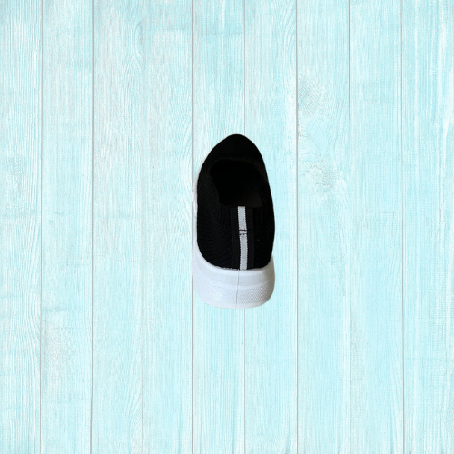Schwarze Loafer mit weißer Sohle